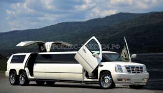 Взять напрокат Cadillac Escalade Tandem (Кадиллак Эскалейд) белого цвета, 12 метровый, 18 мест.
